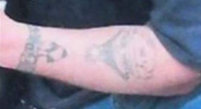 Left arm tattoo on Josh Wellman